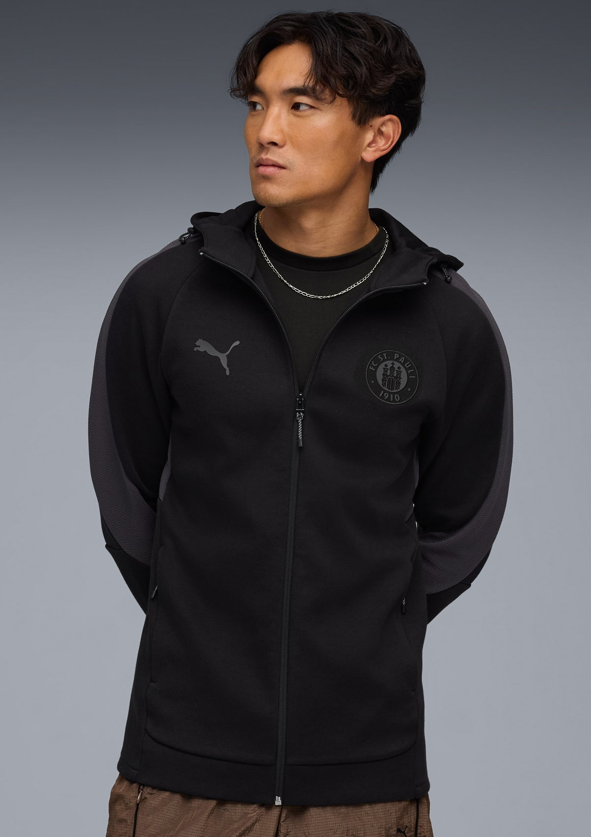 Puma - Kapuzenjacke Staff schwarz 2025-26