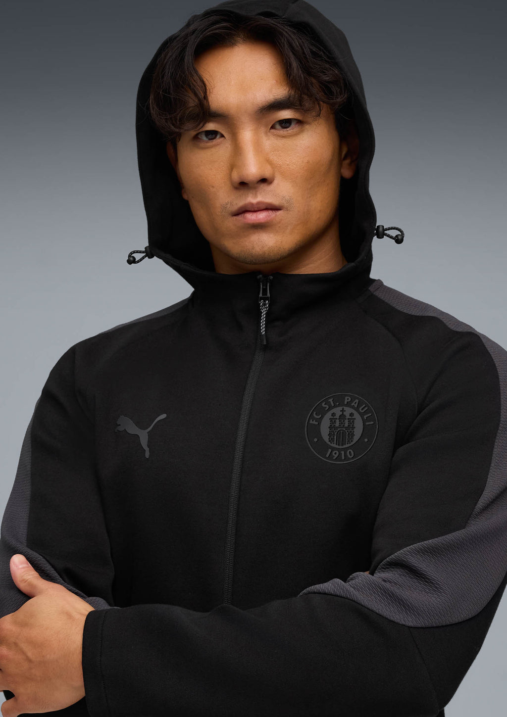 Puma - Kapuzenjacke Staff schwarz 2025-26