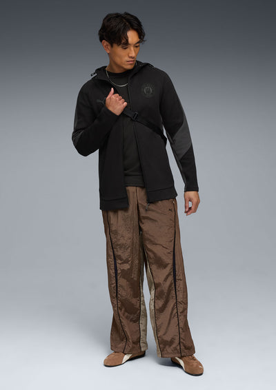 Puma - Kapuzenjacke Staff schwarz 2025-26
