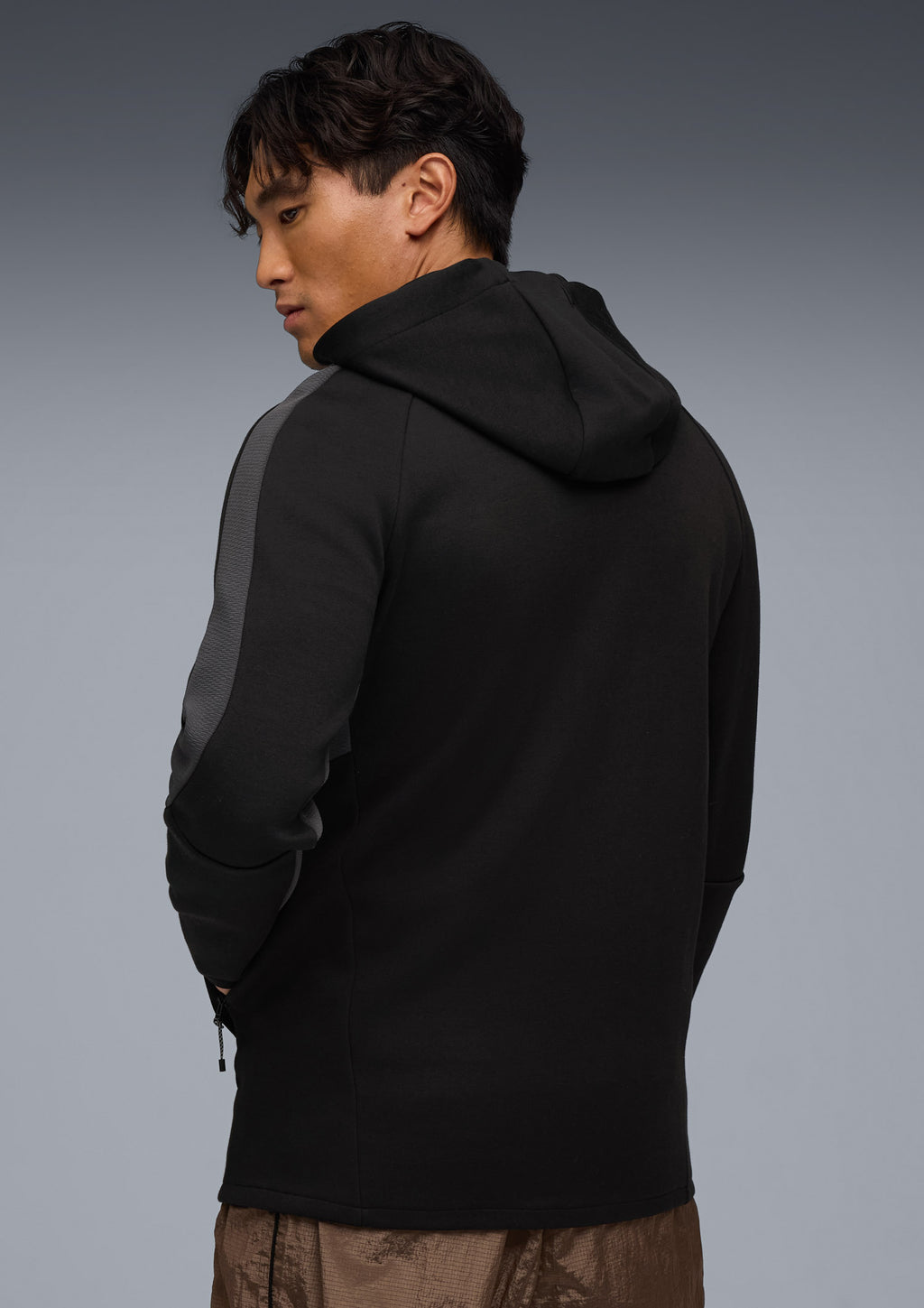 Puma - Kapuzenjacke Staff schwarz 2025-26